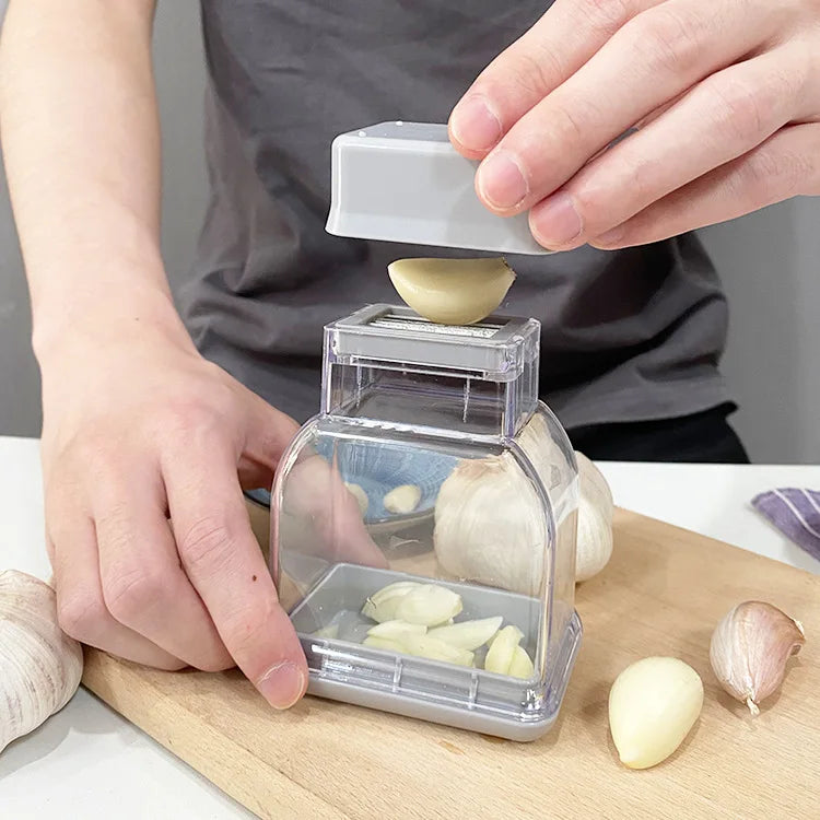 Manual Garlic Press and Grater Tool - Stainless Steel Garlic Chopper, Cutter & Peeler Set